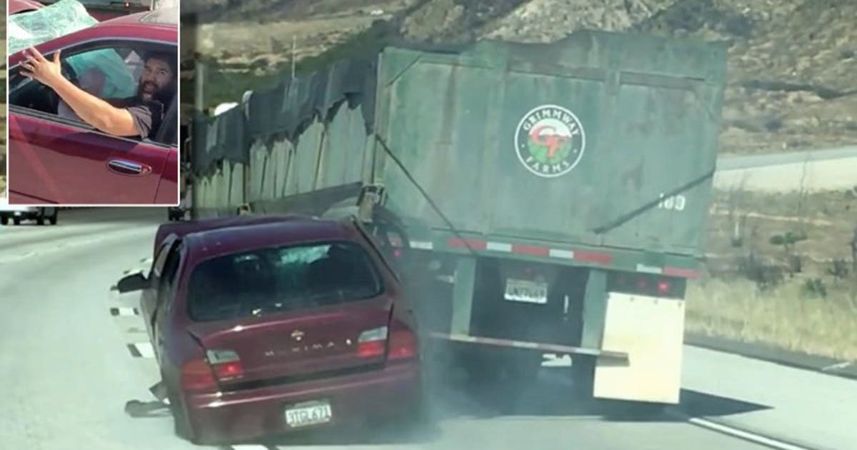 Video shows truck dragging car – with driver still inside – after ...