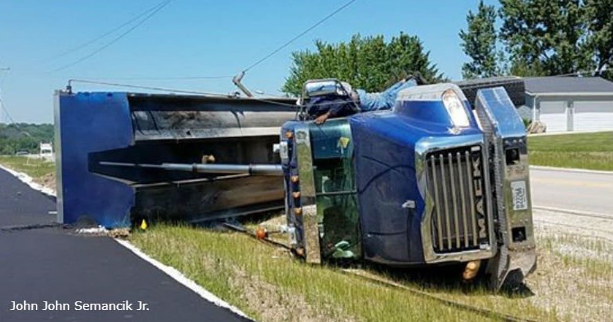 Dump truck takes down power lines in rollover crash near Elmwood School ...