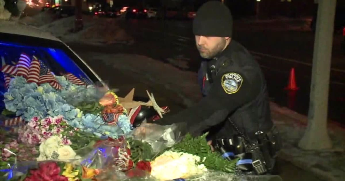 Growing memorial for Matthew Rittner outside MPD Specialized Patrol ...
