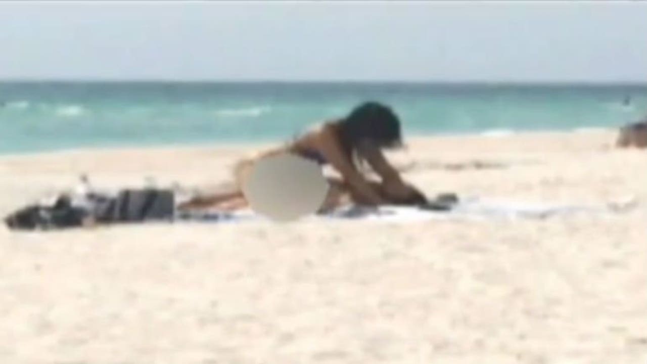 CAUGHT ON CAMERA Florida couple, having sex on a public be photo