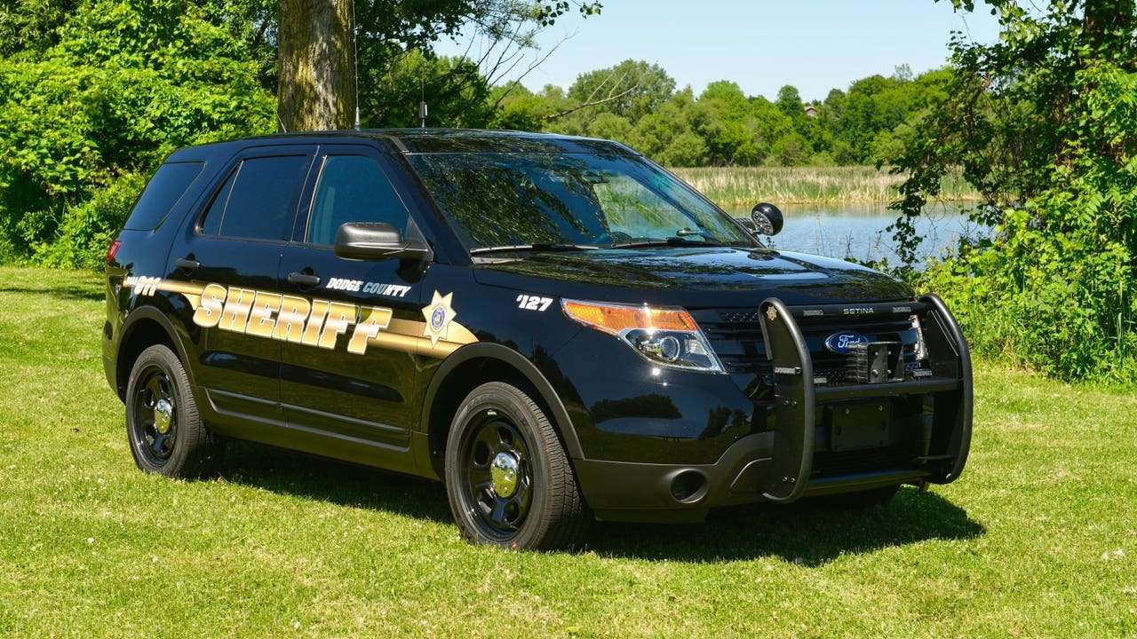 Dodge County Sheriff's Office unveils newly designed squad cars, family
