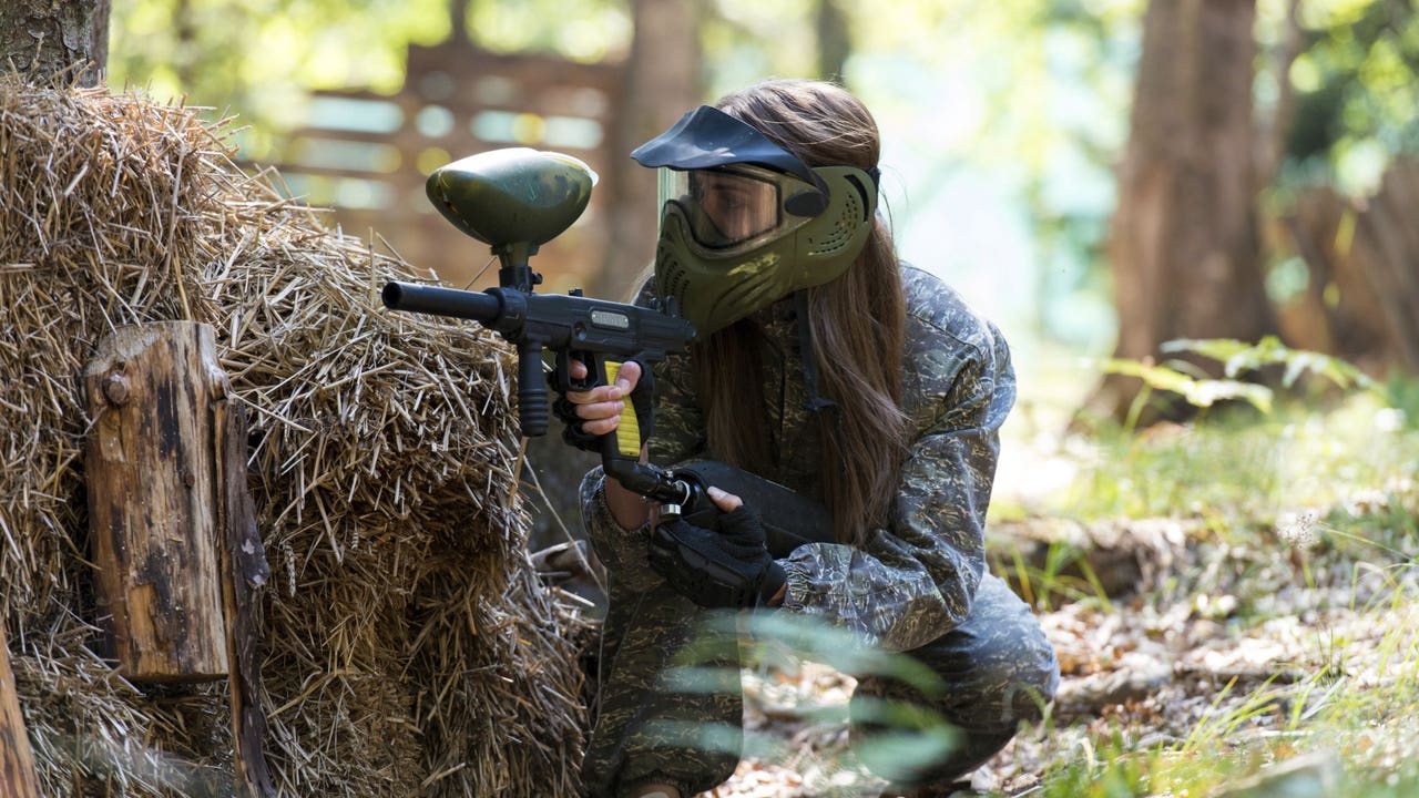 Woman and paintball hi-res stock photography and images - Alamy