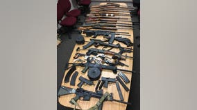 Two men arrested as about 35 firearms, thousands of rounds of ammunition seized from home