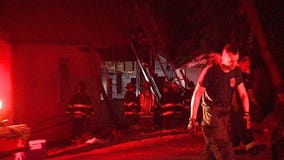 Fire officials respond to house fire near 11th and Keefe