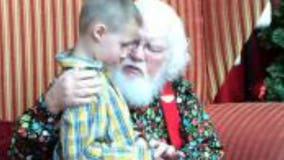 "I told him he's a good boy:" Santa praised for interaction with young boy with autism