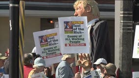 "Catering to the rich:" Protesters gather ahead of Gov. Walker/Pres. Trump fundraiser in Milwaukee