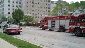 Milwaukee firefighters rescue man from downtown building