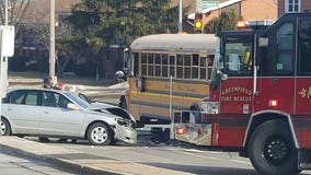 Police investigate crash between 2 cars, school bus in Greenfield