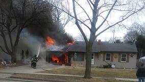 Fire destroys garage on Milwaukee's south side, causes damage to adjacent home
