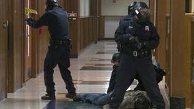 Police recruits take part in "active shooter training"