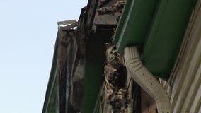 8 families displaced by fire near 34th and Wright; firefighter hurt