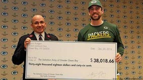 Packers' QB Aaron Rodgers delivers check for $38K to Salvation Army after autograph signing