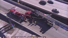 Traffic Alert: Semi overturns and spills scrap metal in Stadium Interchange