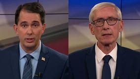 Walker, Evers deliver sharp attacks in first debate