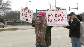 'Lives being destroyed:' Crowds gather in Brookfield, Burlington to protest 'Safer at Home'