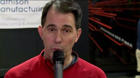 Gov. Walker makes last-minute, new health insurance promise