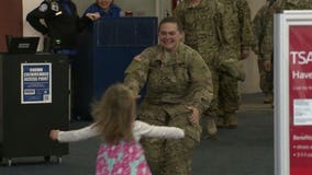 “I’m just so happy:” Families share joyous reunion as soldiers return home for the holidays