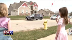 Waukesha elementary school teachers hold 'safe distance' car parade for students, families