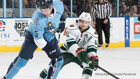 Captain Trevor Smith helps Admirals to 3-2 OT win over Iowa Wild