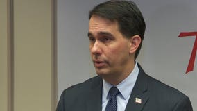 Gov. Walker defends proposed switch to self-insurance program for public workers