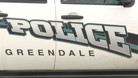 Greendale fatal crash; vehicle strikes electrical box, car in parking lot