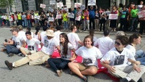 Group rallies for immigration reform outside Senator's office