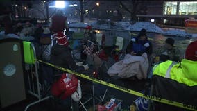 Supporters line up in downtown Milwaukee ahead of President Trump rally