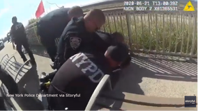 NYPD officer suspended after he was caught on video using banned chokehold is charged