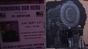 'We miss him terribly:' Fallen Officer Hetland memorialized with mural in Sturtevant