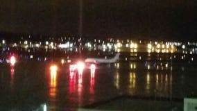 Charter plane carrying Miami Heat slides on taxiway at Mitchell Airport