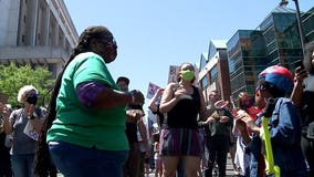 Mothers march on the streets of downtown Milwaukee: 'We hear the cries of our children'