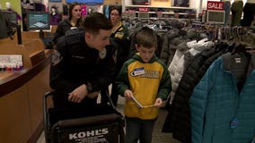 "To brighten the kids' holiday season:" Third graders Shop with a Cop at Bayshore Town Center