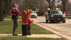 'They really missed the kids:' Christ King staff parades through neighborhoods to visit students