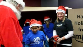 Kenosha's new Amazon employees, with help from Santa, surprise Boys & Girls Club kids