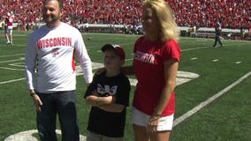 Special young man and his mom honored during halftime of Badgers/Western Illinois game