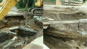 Concrete falls onto gas main after water main break near 7th and Dakota