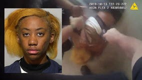 Woman accused of punching, biting officers gets 12 months probation