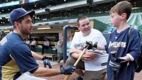 Boy born with half a heart throws out first pitch for Brewers