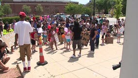 Children, adults protest outside Milwaukee police administration building