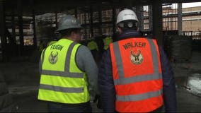 "A lot of excitement:" Governor Walker tours Milwaukee Bucks arena site; shell is 45% complete