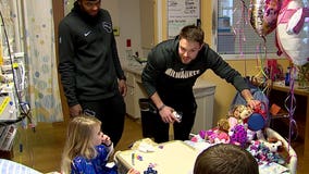 "Bringing joy to kids going through adversity:" Bucks players spread Christmas cheer at Children's Hospital