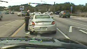 Girl stops to help injured police officer not realizing it's her dad