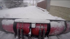 "Crazy busy!" Late winter snowstorm has plow drivers seeing green after mild January, February