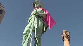 Milwaukee statues don capes to raise breast cancer awareness