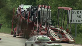 Car carrier strikes overpass along southbound Hwy. 45