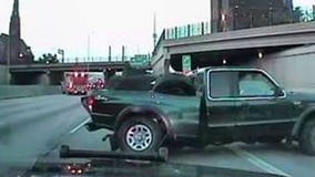 Couch falls off pickup truck, creates mess in Marquette Interchange