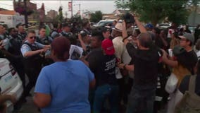 Crowd gathers after man fatally shot by Chicago police