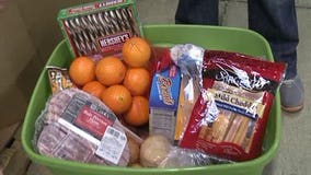 Filling Christmas bins at Hunger Task Force