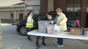 'Glad to be able to help:' Greenfield church holds drive-up mask distribution