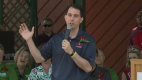 Gov. Walker stops at State Fair, leaves for debate without answering questions